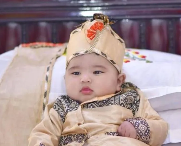 A Dai Ahom Child in Assamese Muga Attire